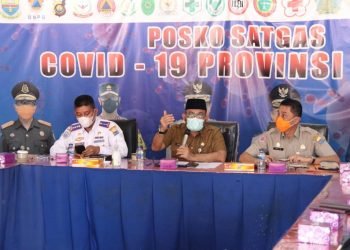 Sekretaris Daerah (Sekda) Provinsi Jambi, H.Sudirman,S.H.,M.H saat memimpin Rapat Koordinasi (Rakor) Penanganan Antisipasi Lonjakan Covid-19 di Provinsi Jambi (foto: Agus Suprianto)