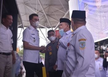 Pj Bupati Muaro Bachyuni Deliansyah, SH. MH. Saat menghadiri peresmian rute baru bus wisata Trans Siginjai