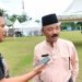 Kepala Dinas Pekerjaan Umum dan Perumahan Rakyat (PUPR) Provinsi Jambi, Fauzi, saat diwawancara wartawan. (Foto RJ.COM/Nasution)