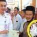 Pj Bupati Muaro Jambi Bachyuni Deliansyah saat menyerahan Sertifikat Hak Atas Tanah Bagi UMKM. Rabu (04/01/2023). (Dok. Diskominfo Muaro Jambi)