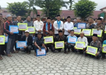 Poto bersama usai penyerahan bantuan dana hibah rumah ibadah secara simbolis (Dok. Riky)