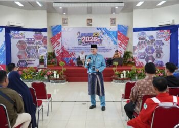 Kadis Kominfo  Provinsi Jambi, Drs. Ariansyah, M.E., menyampaikan materi tentang bahaya judi online dalam kegiatan sosialisasi Bulan K3 Nasional 2026 yang digelar PT Pertamina Hulu Rokan Jambi Field di GSG Kenali Asam, Kota Jambi, Rabu (21/1/2026). (Dok. Stepanus)